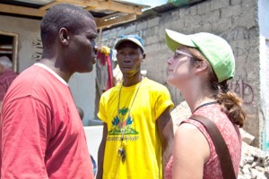 Jillian Thorp talks with engineers in Haiti.
