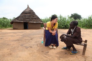 Jenny Simmons talks with a woman in South Sudan