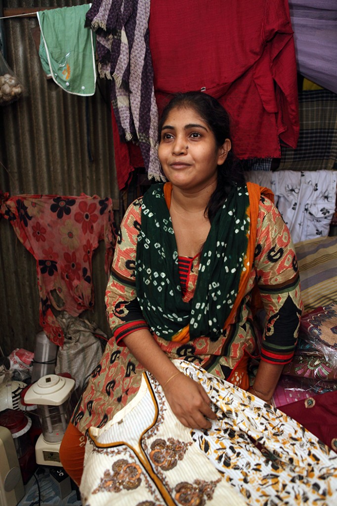 Microcredit - Lady holding clothing - Bangladesh