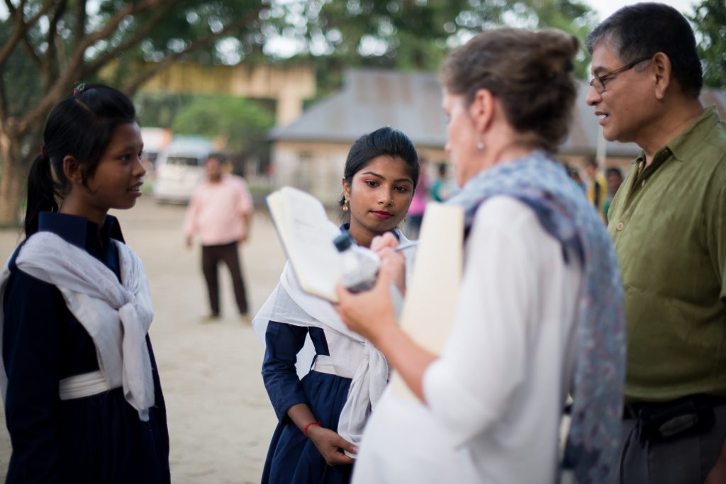 interviewing girls who received scholarships in Bangladesh