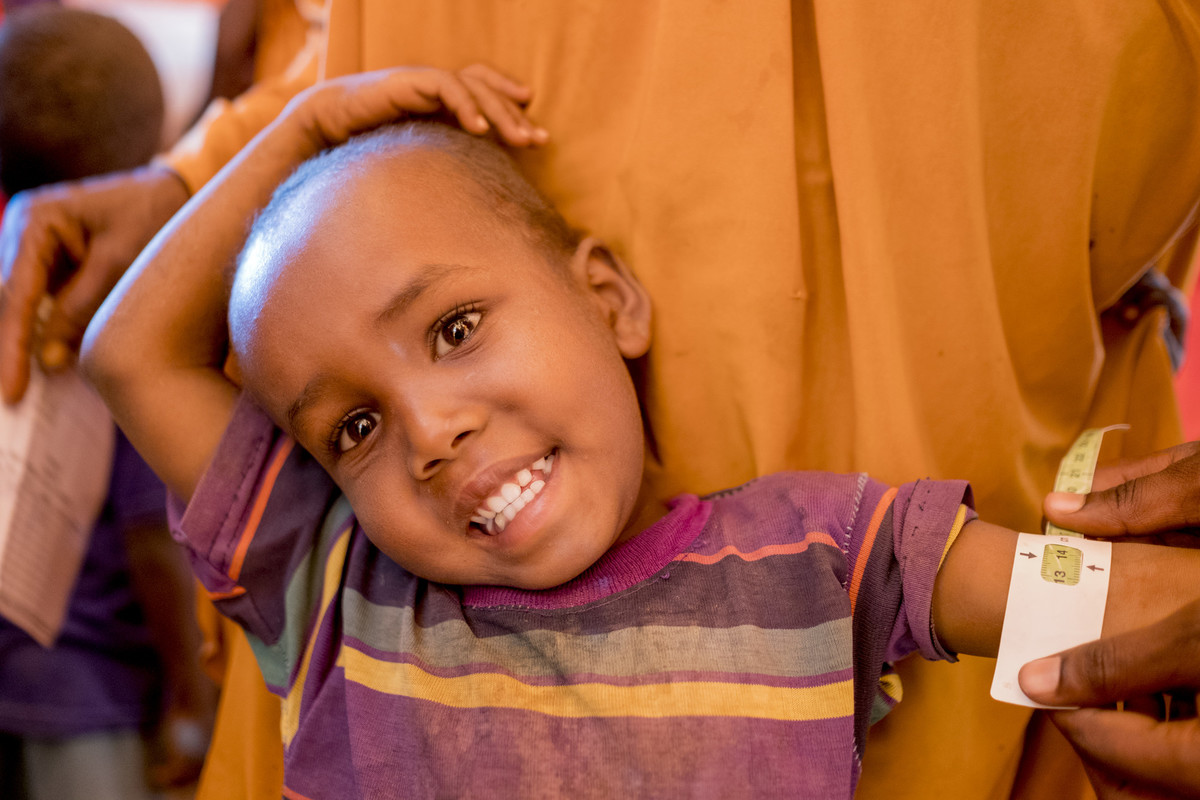 a boy is screened for malnutrition in Somalia