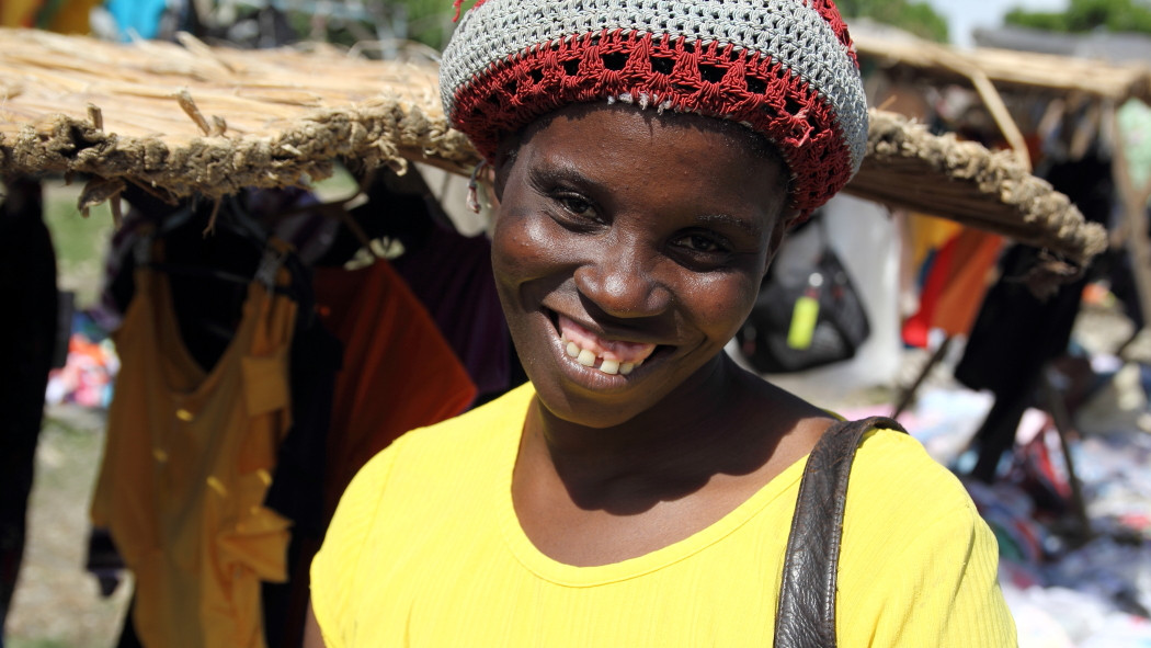 Meet Bellia – This mother of two sells clothing, shoes, and purses. With her loan she was able to purchase products her customers were asking for.