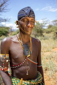 man with closed eyes listening to a solar audio Bible